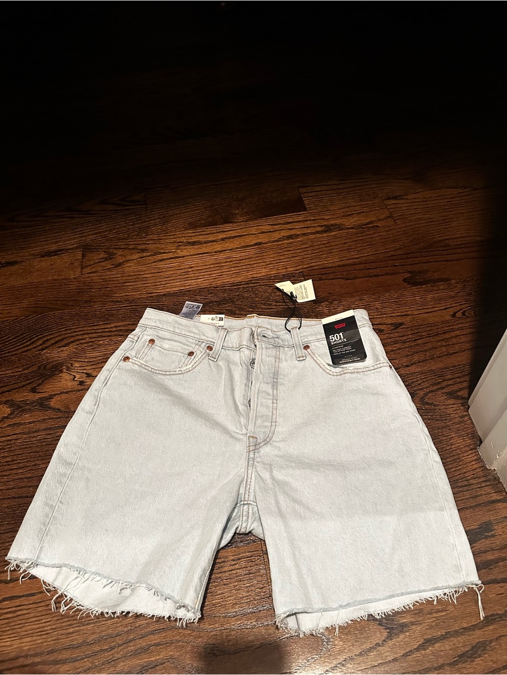 Levi's Light Wash Frayed Hem Denim Shorts